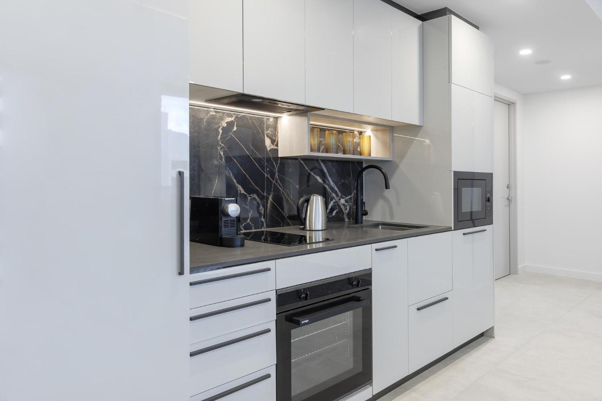 Meriton Suites Camberra Exterior foto A modern kitchen