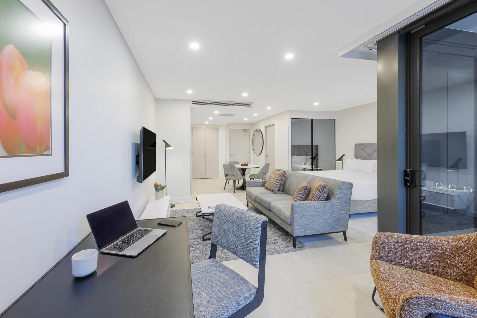 Meriton Suites Camberra Exterior foto A typical apartment interior