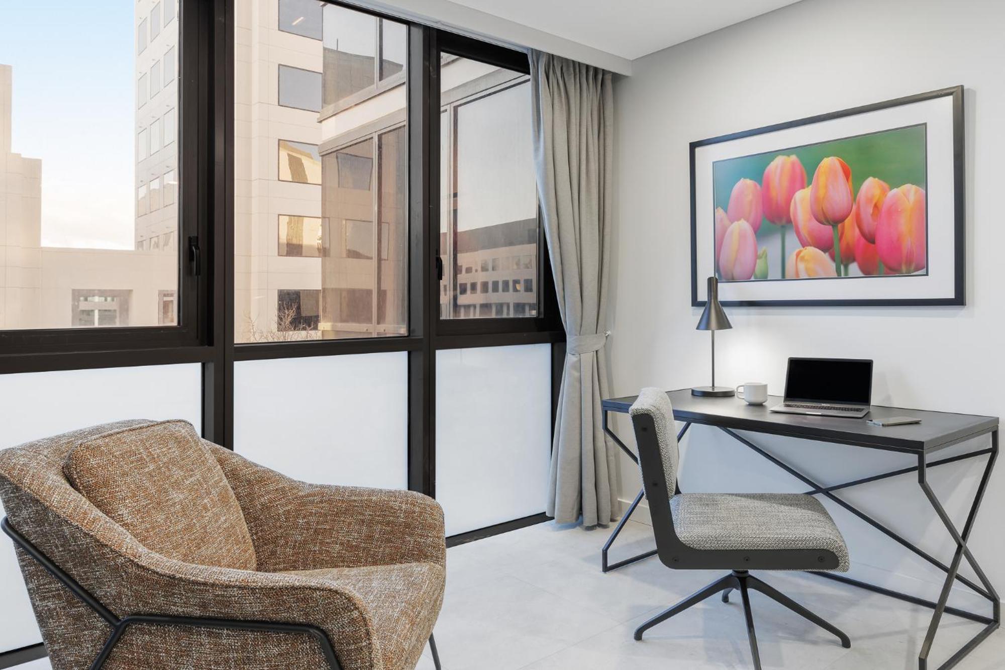 Meriton Suites Camberra Exterior foto A typical apartment at The Met